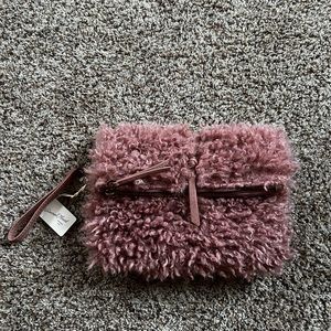 Darling pink clutch style purse. Fun fabric.